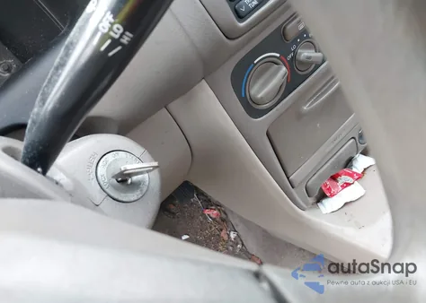 2002 Toyota Corolla Ce из США, поврежденный, VIN 2T1BR12E92C577731